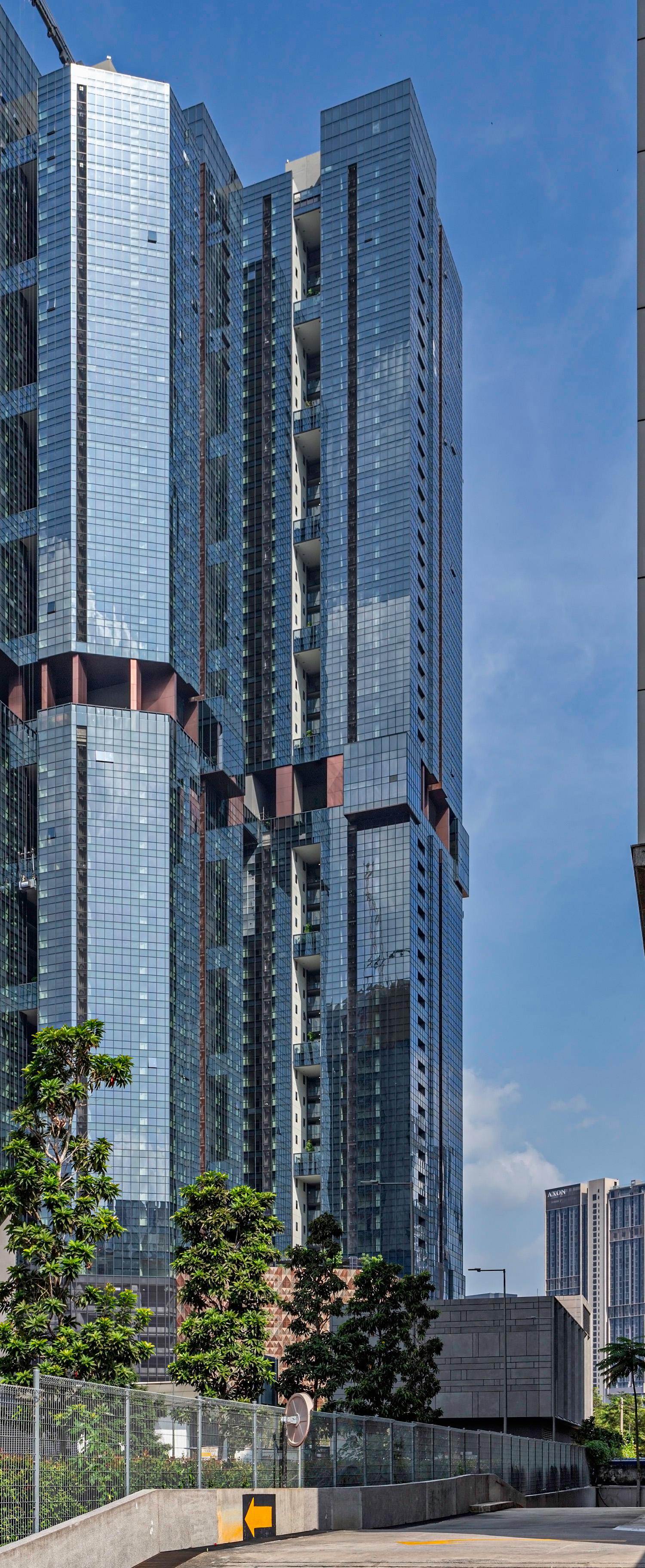 TRX Residences Tower A - Tower A (center) partly hidden behind Tower B 